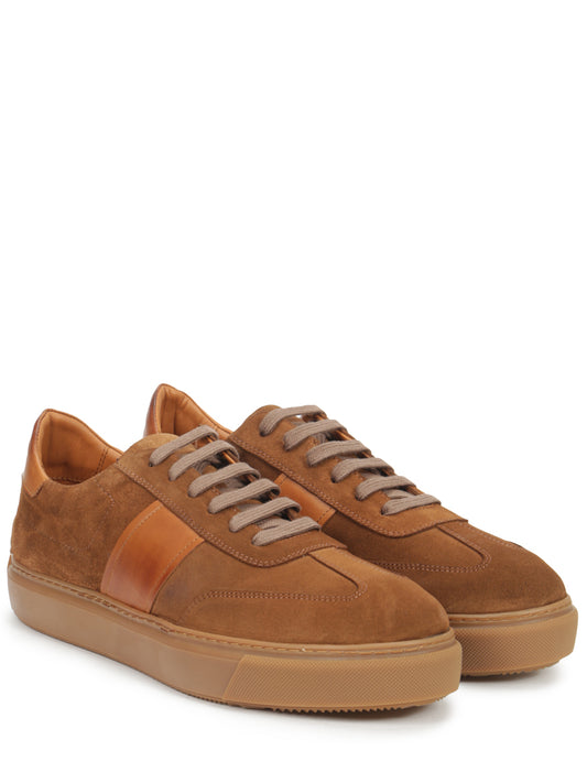 Suede sneakers decorated with leather inserts