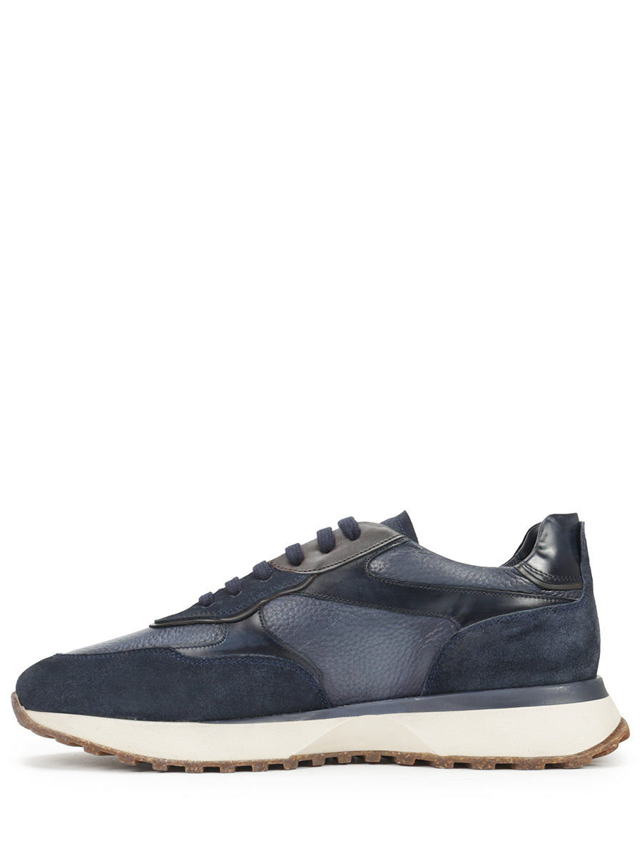 Suede sneakers decorated with suede inserts