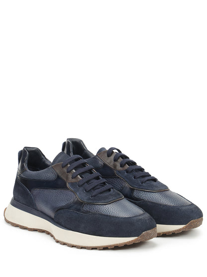 Suede sneakers decorated with suede inserts