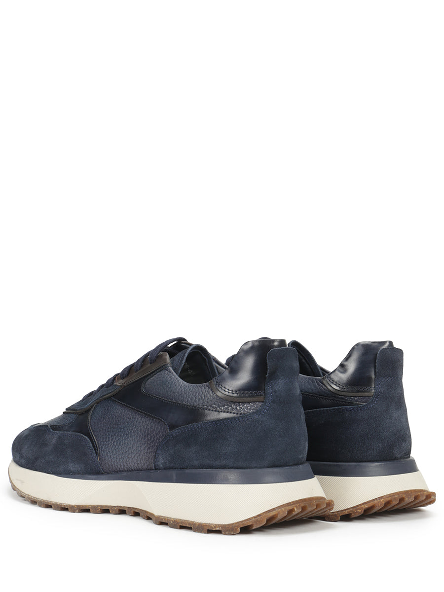 Suede sneakers decorated with suede inserts