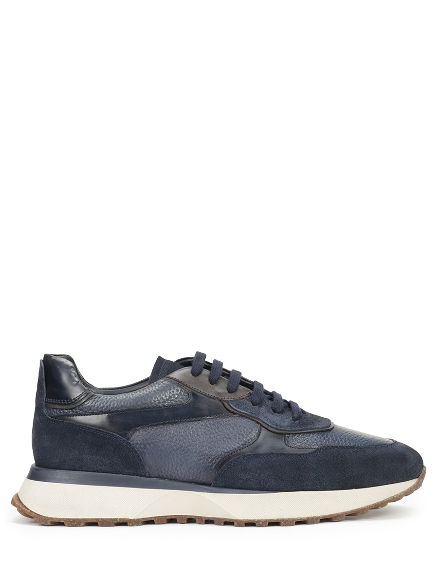 Suede sneakers decorated with suede inserts