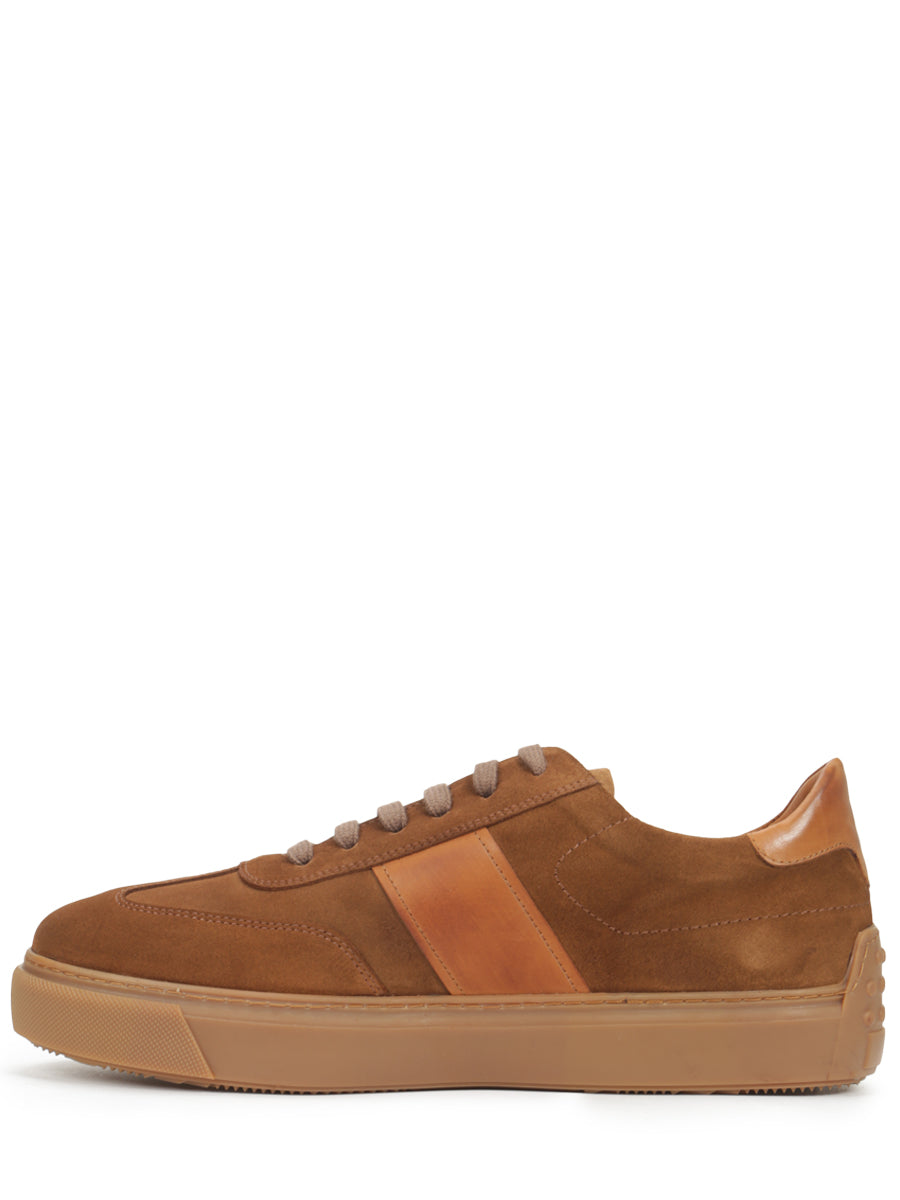 Suede sneakers decorated with leather inserts